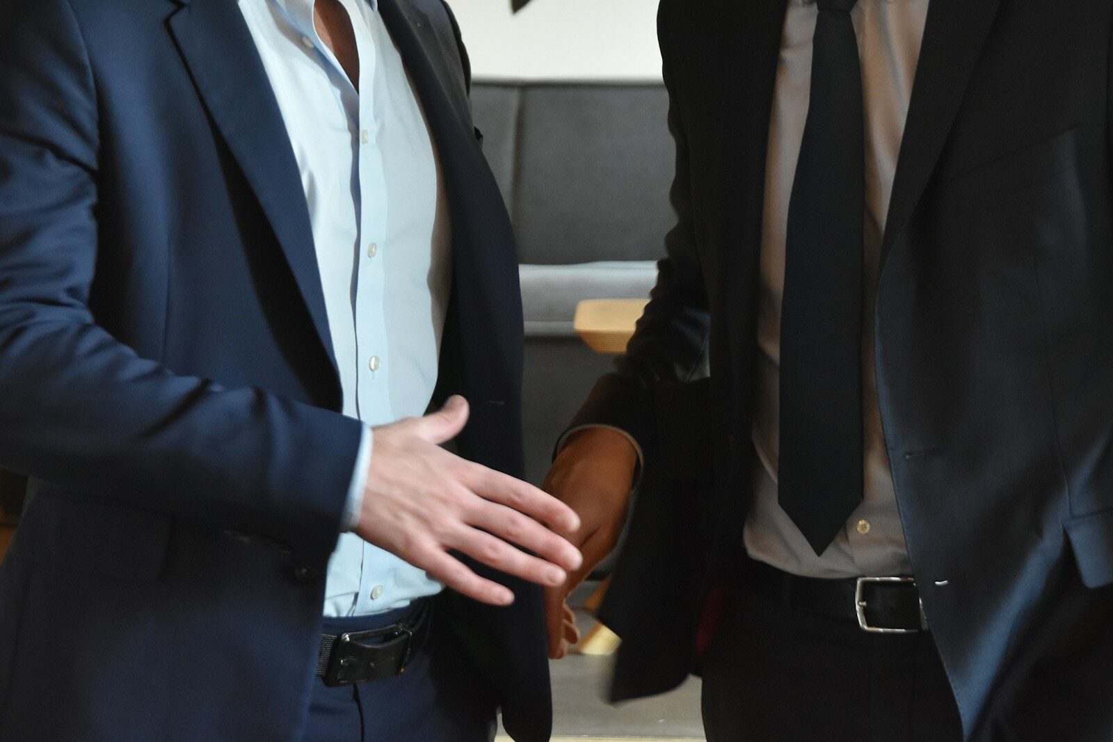 Businessmen are shaking hands in a professional gesture