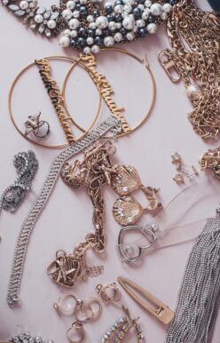 A collection of gold and silver jewelry including necklaces, earrings, and rings